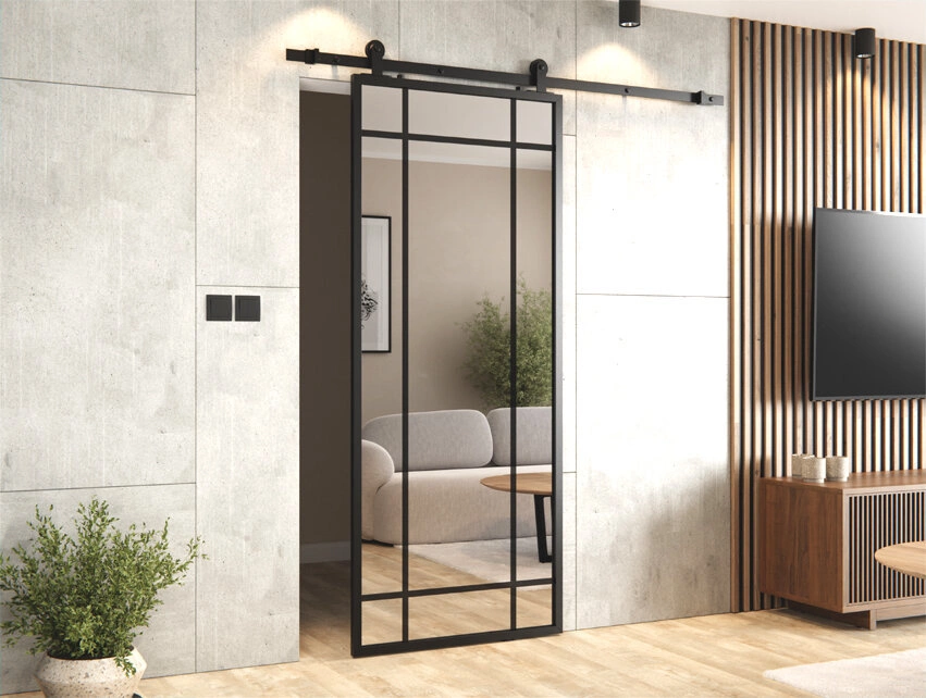 Drzwi przesuwne z lustrem – sposób na optyczne powiększenie małego mieszkania